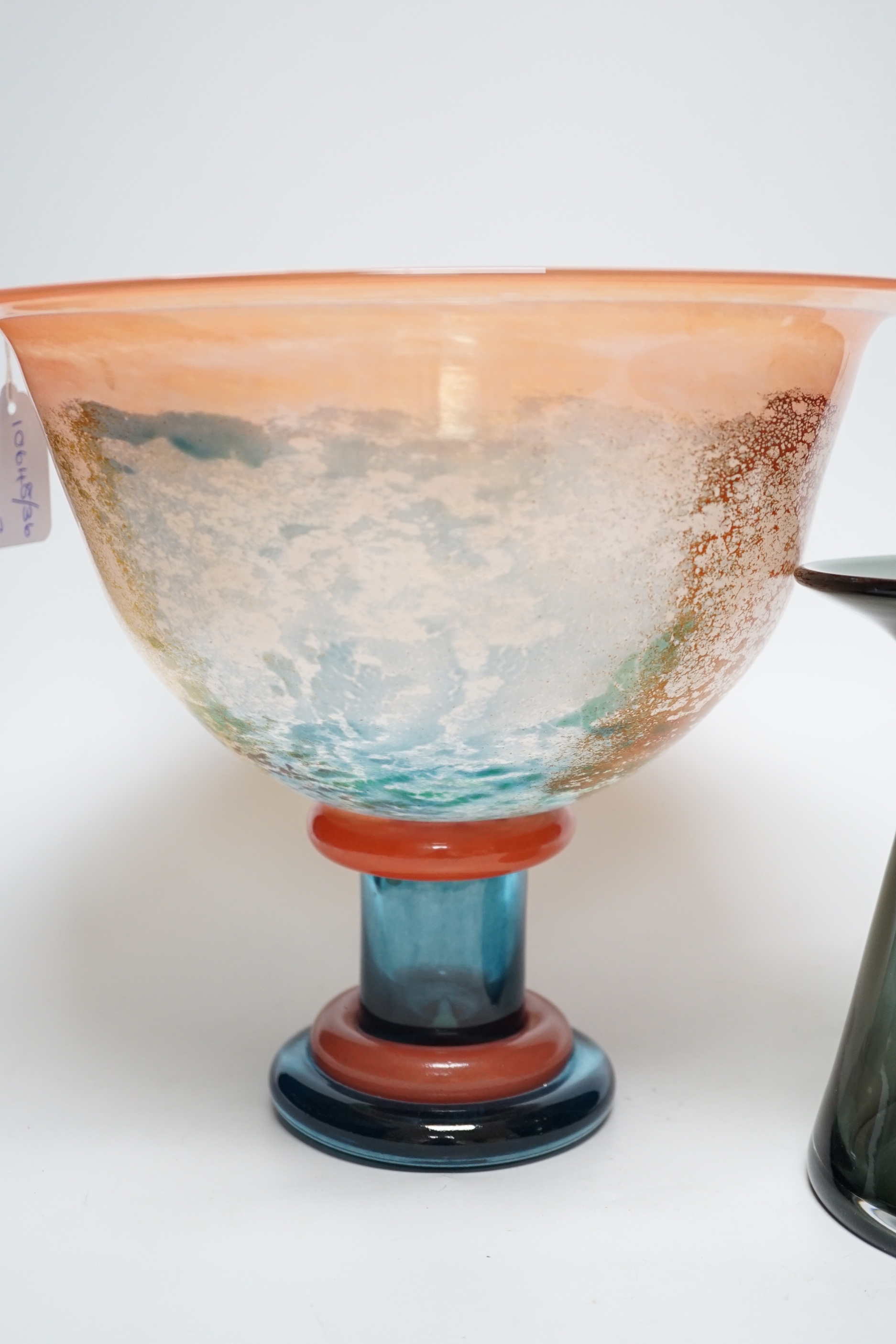 An large Kosta Boda art glass pedestal centrepiece indistinctly signed and a Dartington vase with trailed decoration, the largest 26cm high
